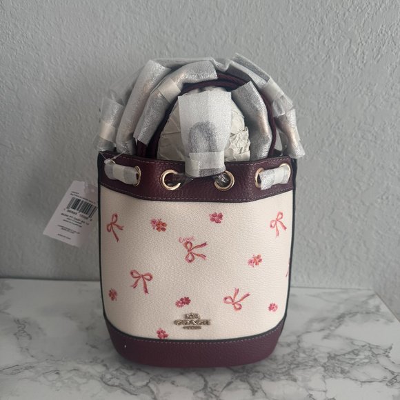 Coach Handbags - coach Dempsey Drawstring Bucket Bag 15 With Bow Print cn707